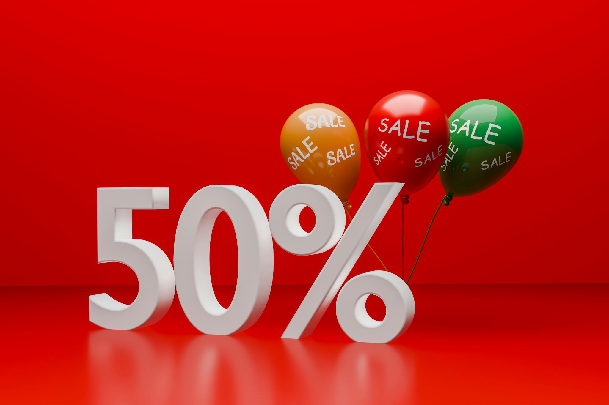 Bright red promotional image showcasing a 50% sale with balloons.