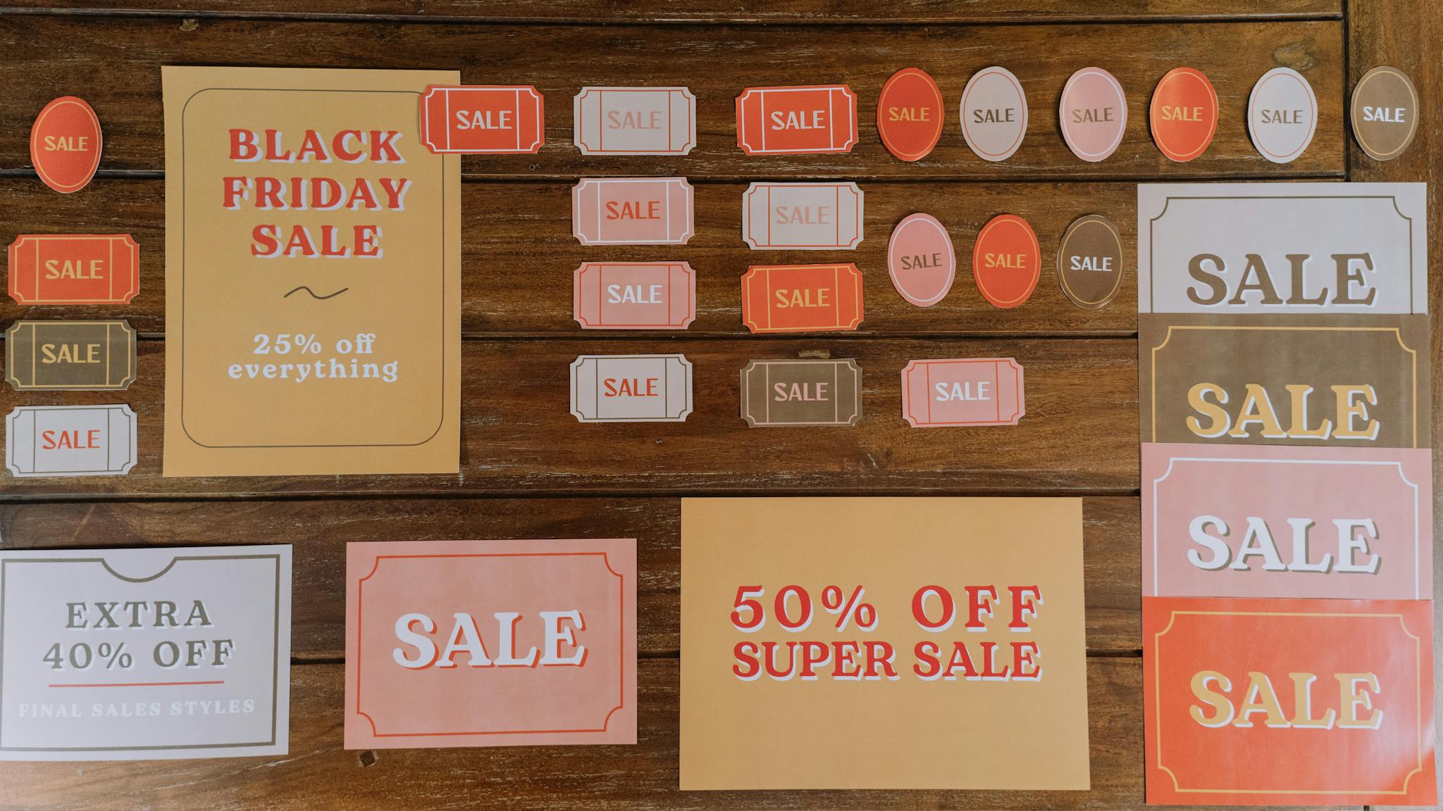 Variety of sale signs for Black Friday discounts and promotions.